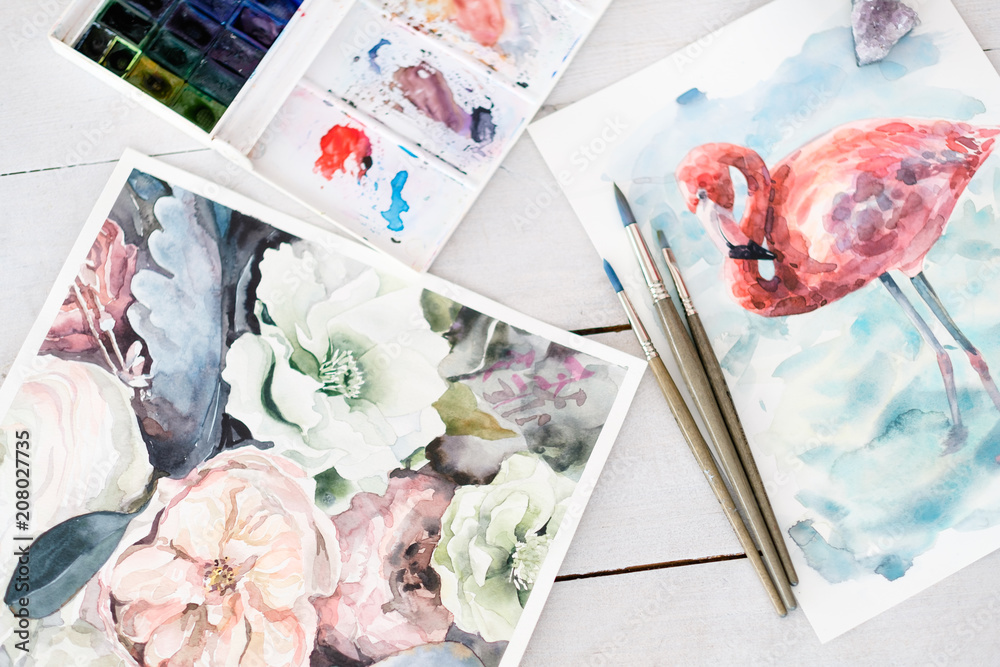 Fototapeta premium artwork painting hobby and leisure concept. beautiful watercolor pictures of flowers and flamingo