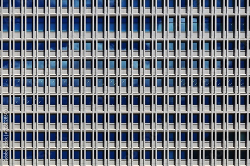 office building. innovation urban work place. modern repetitive pattern facade architecture. business and design background. energy efficient building