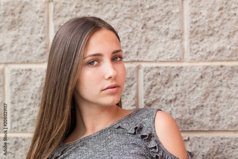 beautiful girl on background wall beautiful girl on background wall