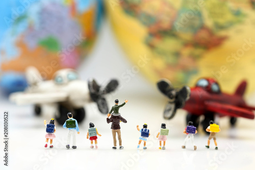 Miniature people : student and children with airplane,education and fun travel concept.