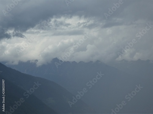 mountains of south tyrol bad weather fog clouds italy europe © Sonja