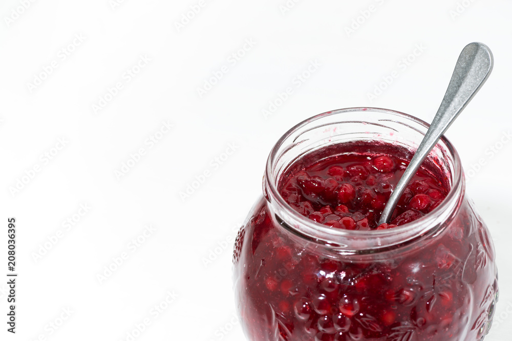 jar with sweet cowberry jam on white background jar with sweet cowberry jam on white background