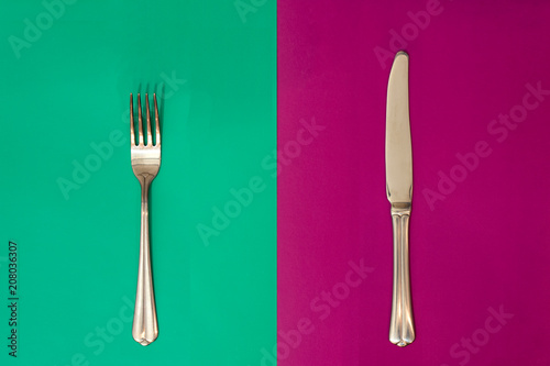 Fork on purple background. Knife on a bright turquoise background. concept. Seamless pattern © Николай Крапивин
