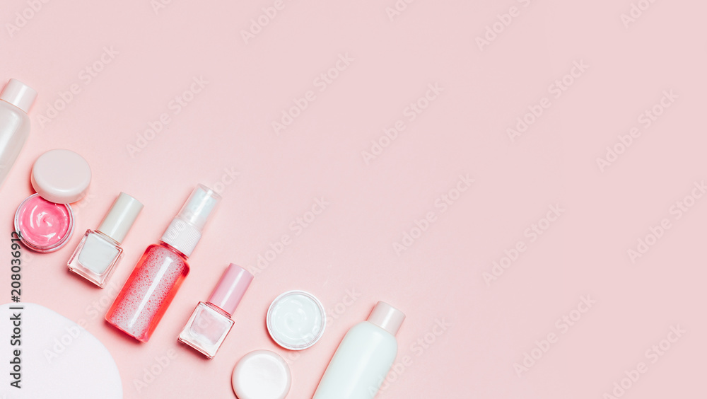 Pink decorative cosmetic on pink background. Pink decorative cosmetic on pink background.