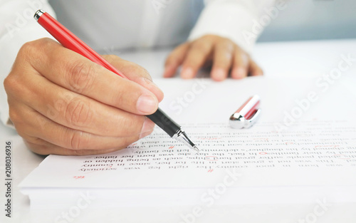 proofreading paper on table