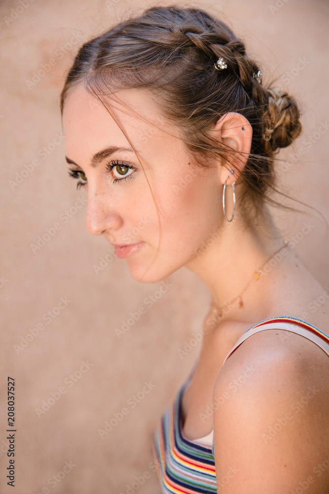 Profile of a teenage girl with braids Profile of a teenage girl with braids