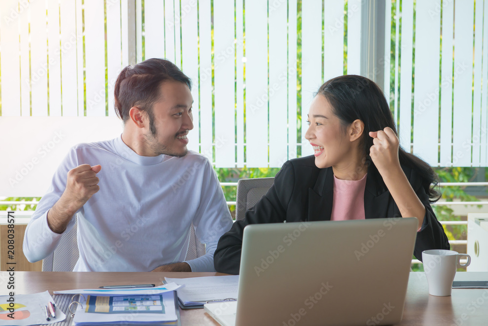 business man and business woman working the job to success in office. Teamwork concept business man and business woman working the job to success in office. Teamwork concept