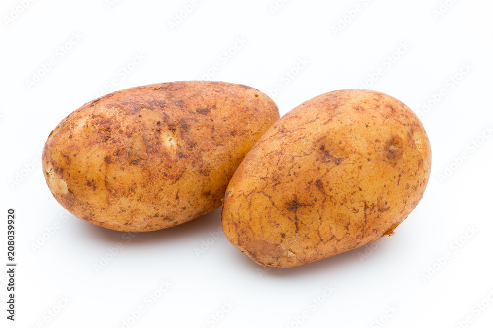 A bio russet potato isolated white background. A bio russet potato isolated white background.