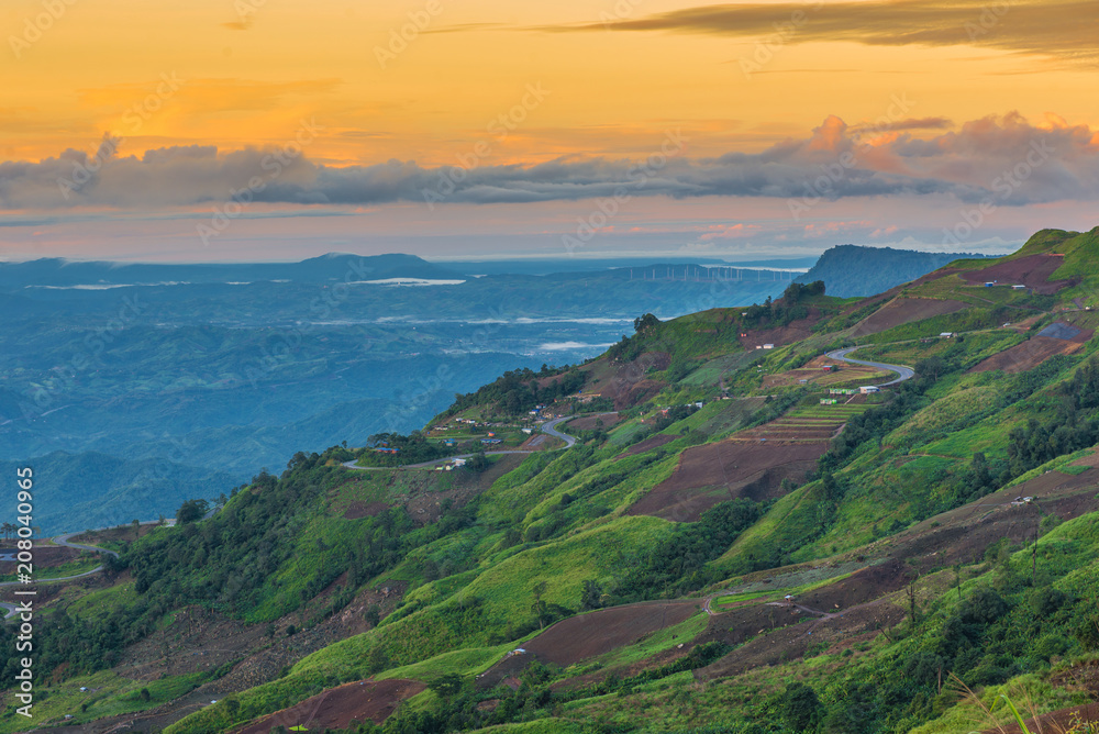 mountains under mist in the morning with sunrise at Phu Tub Berk, Petchabun Thailand mountains under mist in the morning with sunrise at Phu Tub Berk, Petchabun Thailand