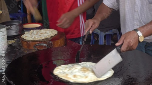 Roti frying oil in a frying pan