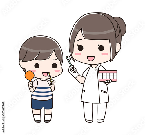 男の子に歯磨き指導をする歯科衛生士の女性（全身）