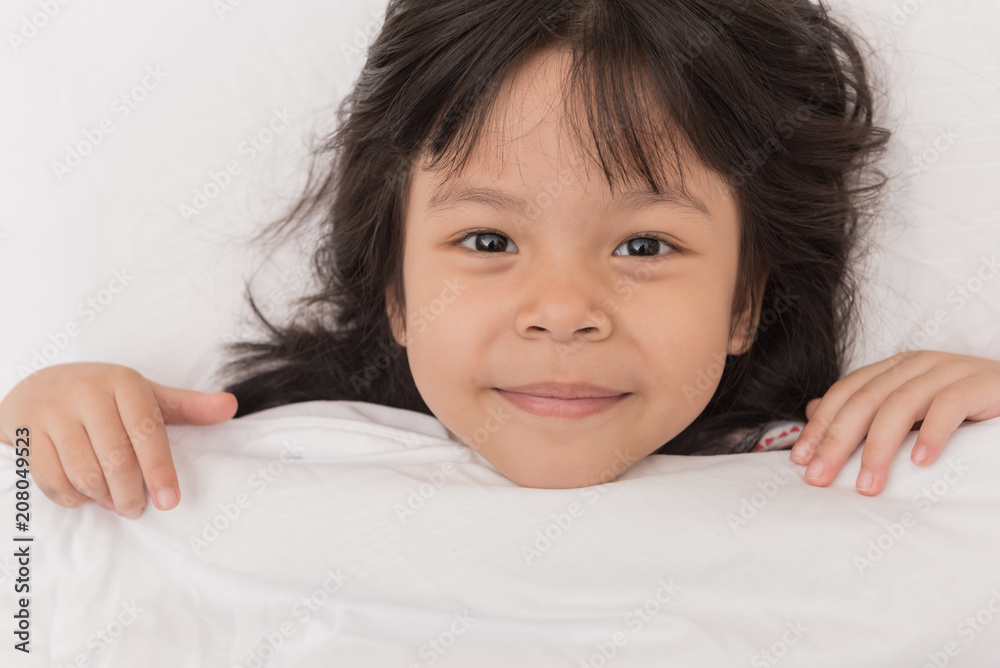 Sleeping child in white bedding room Sleeping child in white bedding room