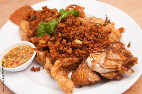 Fried fish and garlic thai style sauce - Thai food