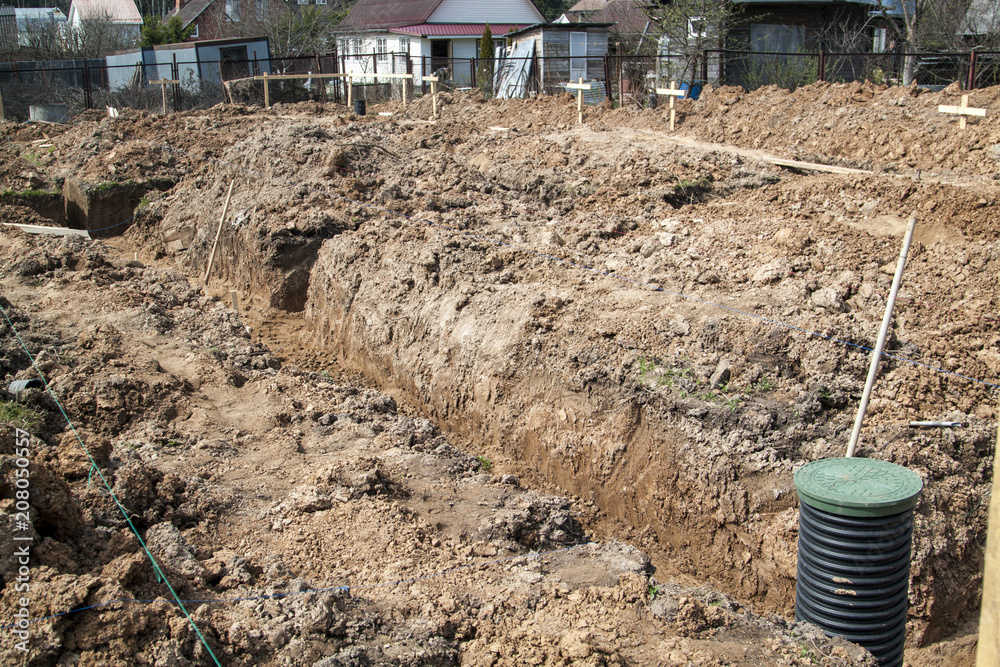 trench dug by hand under the Foundation or for laying drainage trench dug by hand under the Foundation or for laying drainage