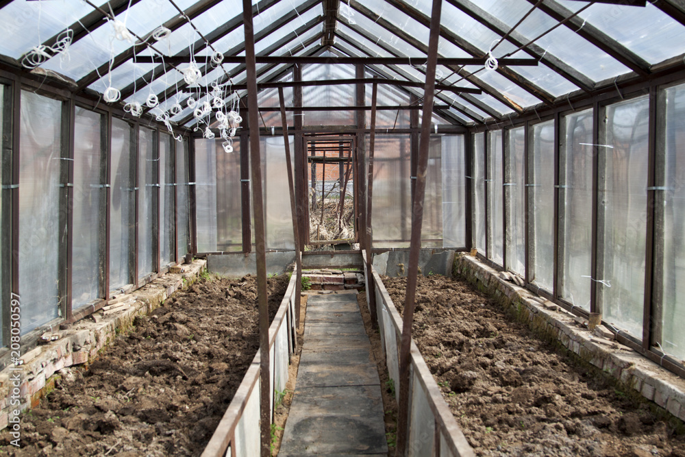 empty greenhouse with treated ready-to-plant ground