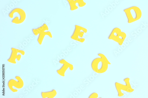 Yellow letters on a blue background. Back to school background. 