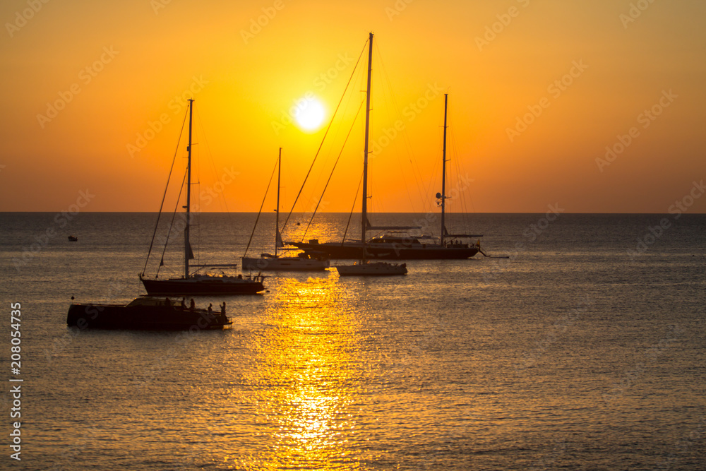 Yachts at sunset Yachts at sunset
