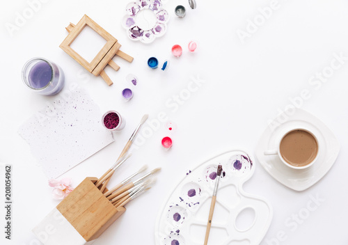 Art workspace for designer and artists. Flat lay with brushes and paint. Minimal concept