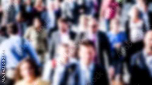 City commuters. Blur image of workers in generic city. Unrecognizable faces