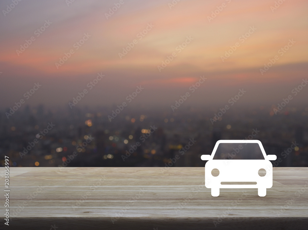 Fototapeta premium Taxi car flat icon on wooden table over blur of cityscape on warm light sundown, Business service car concept