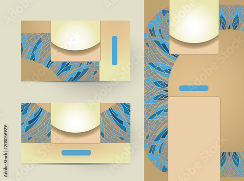 Business cards and booklet with geometric diamond-shaped ornament in a range of blue and flesh colored.