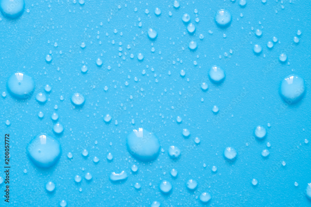 Water drops on blue background