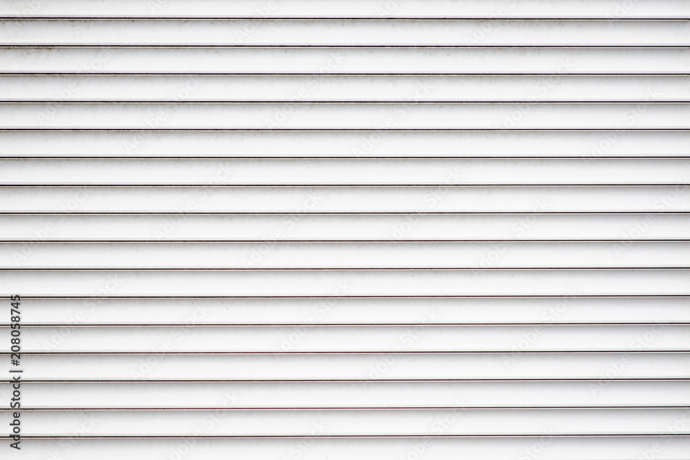 Texture of closed window blind is close