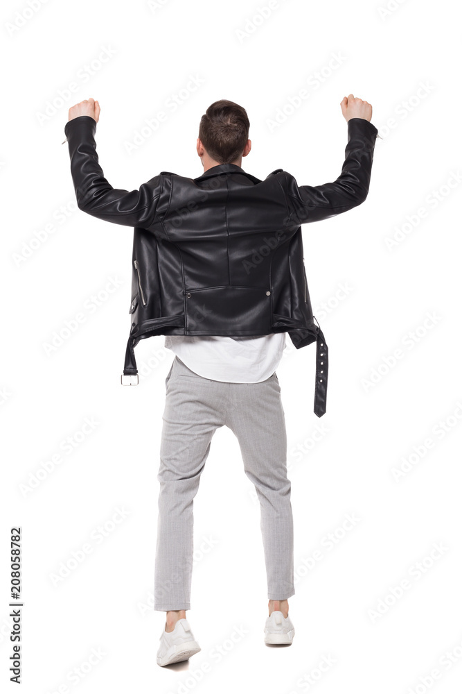 Bac view of a happy man in a leather jacket. Bac view of a happy man in a leather jacket.