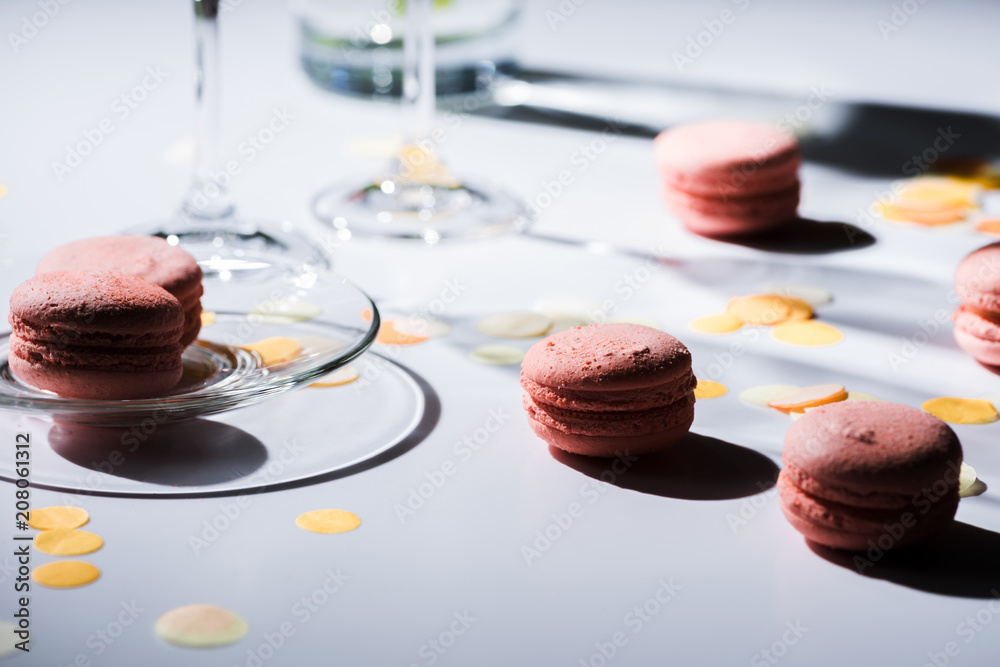 close up view of arranged sweet macarons on tabletop close up view of arranged sweet macarons on tabletop