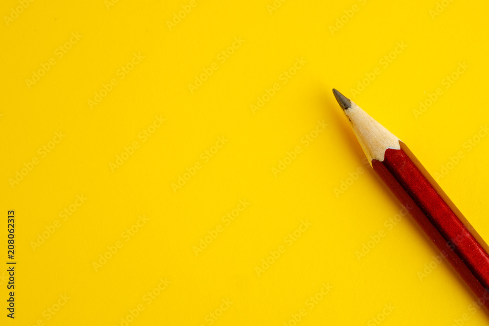 Pencil on yellow background Pencil on yellow background