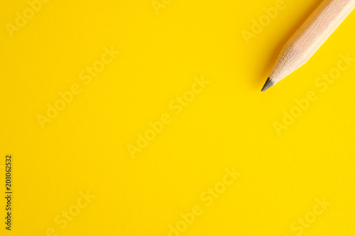 Pencil on yellow background