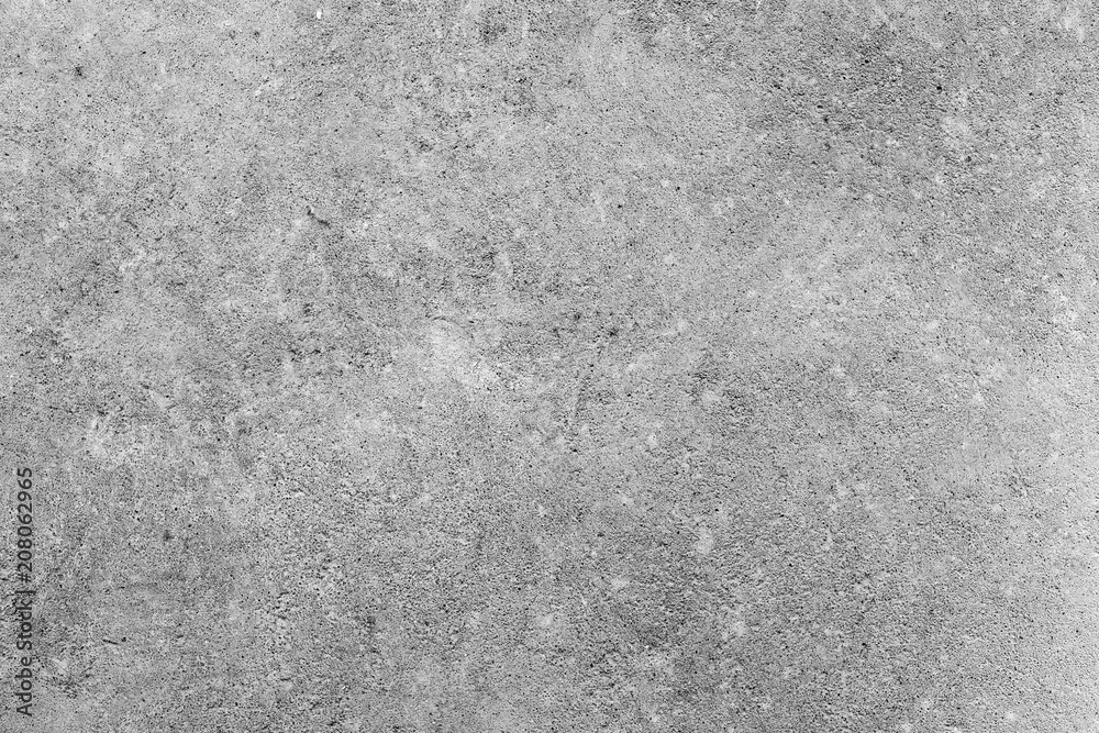 Concrete gray and white background of natural cement or stone texture on a wall or floor Concrete gray and white background of natural cement or stone texture on a wall or floor