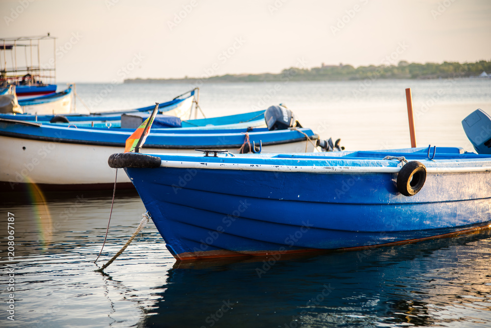 Old boats on Nesebar harbour, Bulgaria. Sunset photo of boats in Black sea Old boats on Nesebar harbour, Bulgaria. Sunset photo of boats in Black sea