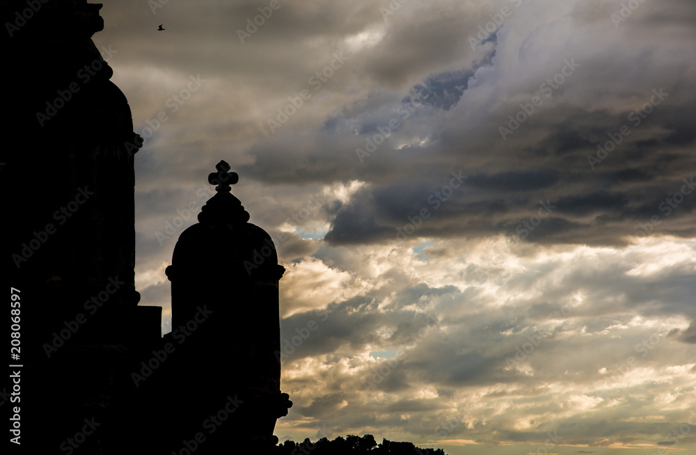 Belem Tower gothic medieval turrets with wonderful sky at sunset, near Lisbon in Portugal