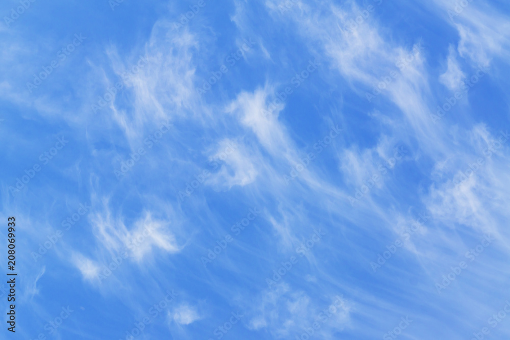 Fototapeta premium blye sky with white fluffy clouds background.