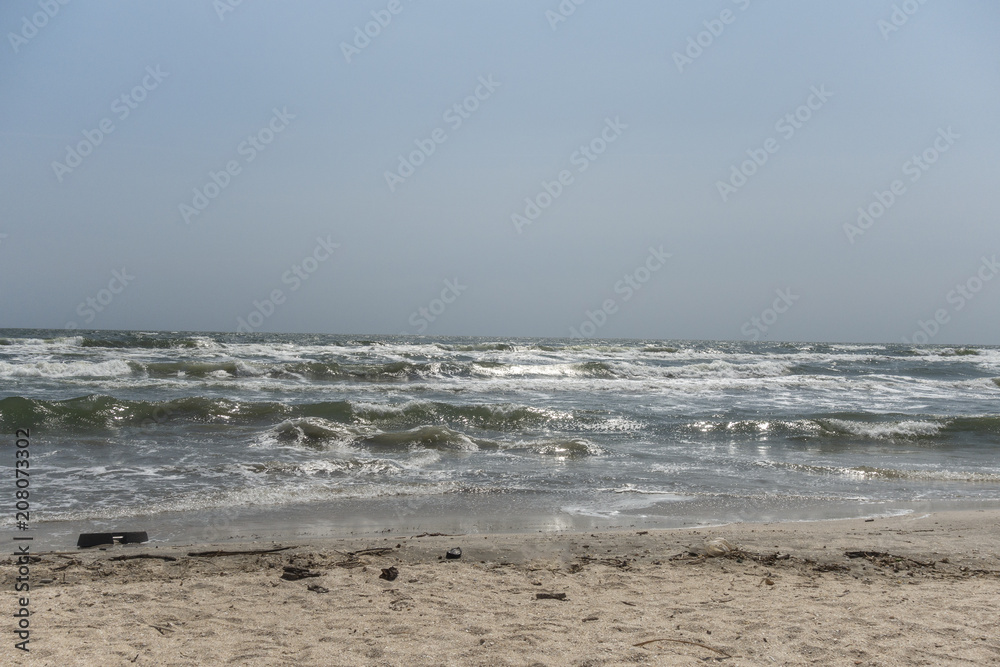 Landscape with The Black sea, sand and beach elements 