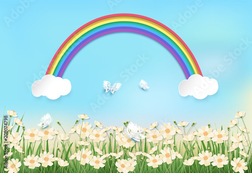Cosmos flowers field and rainbow on blue sky background paper art, paper craft style illustration