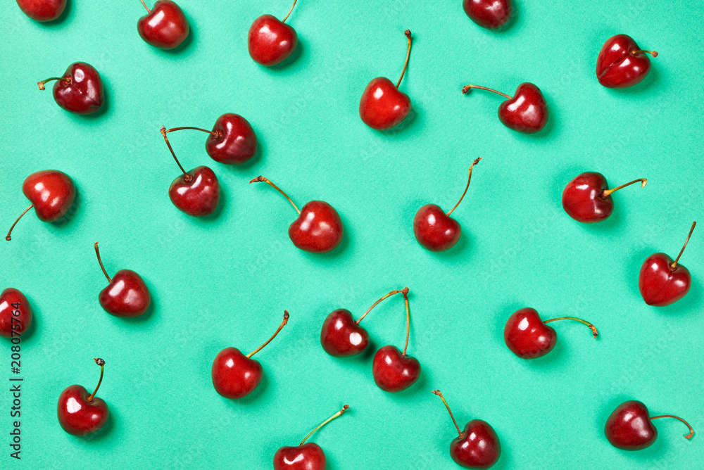 Cherries on green background Cherries on green background