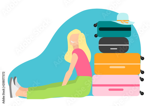 The girl sitting next to suitcases