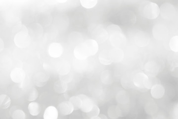 A brilliant blurry white background for a festive mood. Template for greeting card for entertainment.