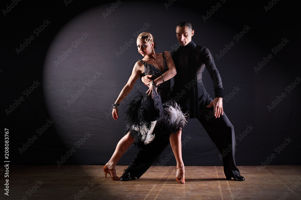 dancers in ballroom isolated on black background dancers in ballroom isolated on black background