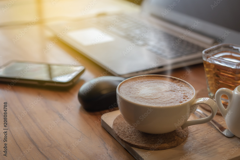 Obraz premium hot coffee, laptop, notebook and smart phone
