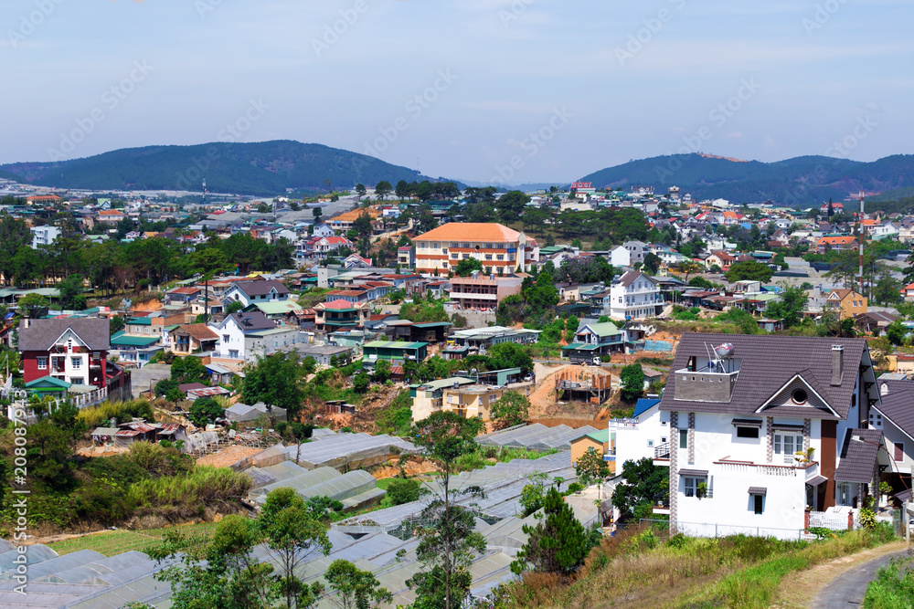 Top view Dalat city with blue sky and clouds, Dalat Vietnam. Vacation, holiday concept.