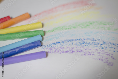 ulticolored crayons for drawing.isolated on a white background photo