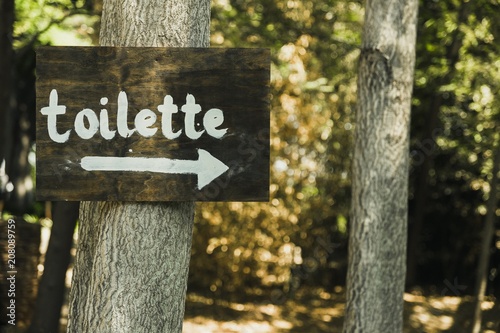 Direction sign of the toilette