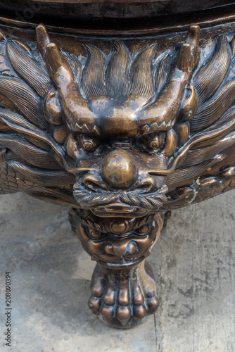 Dragon head sculpture in a buddhist temple in Chengdu, China