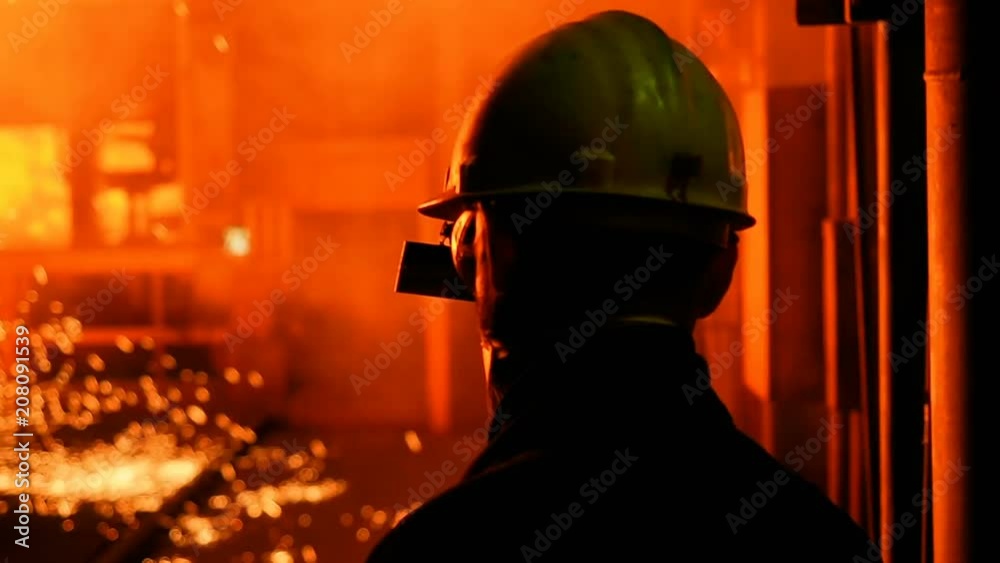 Metallurgist Job Worker In A Steel Plant Hot Molten Metal Pouring. Blast Furnace Steel Production Steel Works. Pouring Hot Liquid Metal From Furnace Metallurgical Plant. Worker Heavy Industry Factory. Metallurgist Job Worker In A Steel Plant Hot Molten Metal Pouring. Blast Furnace Steel Production Steel Works. Pouring Hot Liquid Metal From Furnace Metallurgical Plant. Worker Heavy Industry Factory.