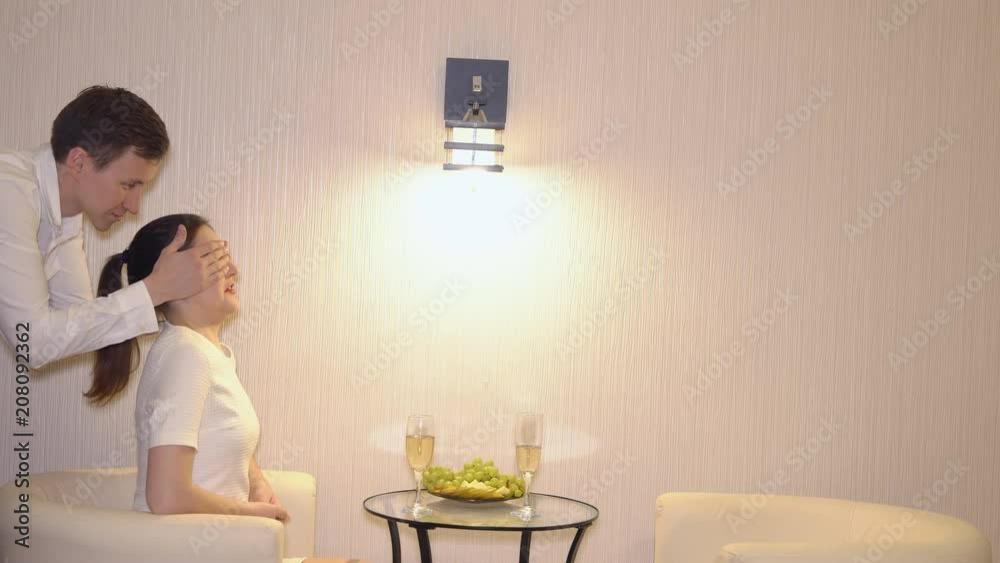 Romantic evening of a couple with champagne and fruits. Romantic evening of a couple with champagne and fruits.