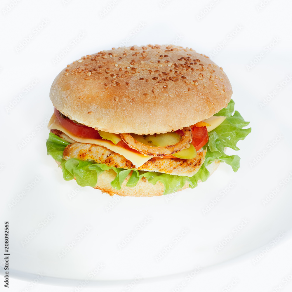 Burger with chicken cutlet, on a white background. Burger with chicken cutlet, on a white background.