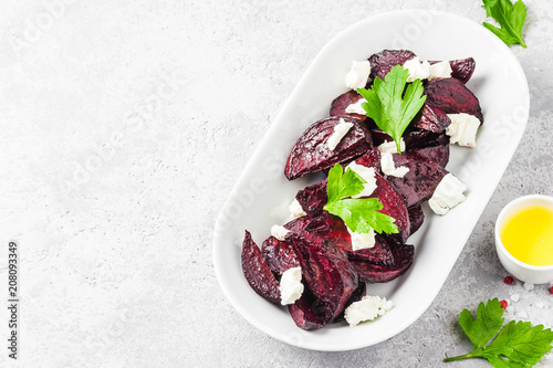 Healthy roasted beetroot feta cheese salad. Selective focus, space for text.